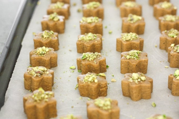 Persian Chickpea Cookies with Pistachio (Nan-e Nokhodchi) is a crumbly, melt-in-your-mouth cookie, made with the fragrant flavours of rose water, cardamom and pistachio. | aheadofthyme.com