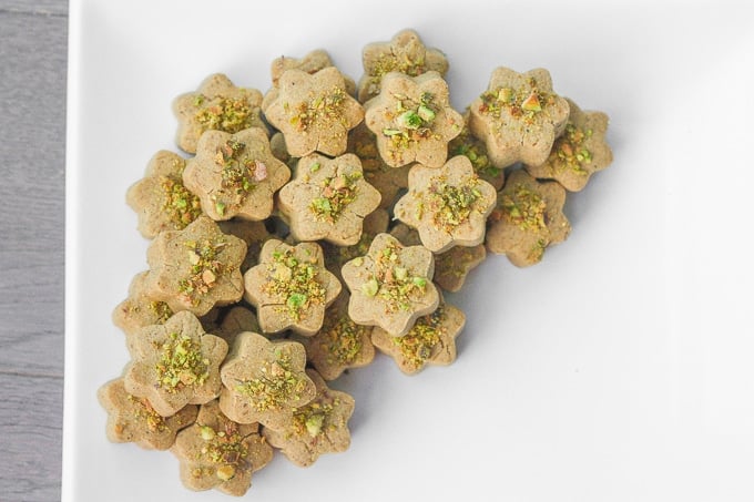 Persian Chickpea Cookies with Pistachio (Nan-e Nokhodchi) is a crumbly, melt-in-your-mouth cookie, made with the fragrant flavours of rose water, cardamom and pistachio. | aheadofthyme.com