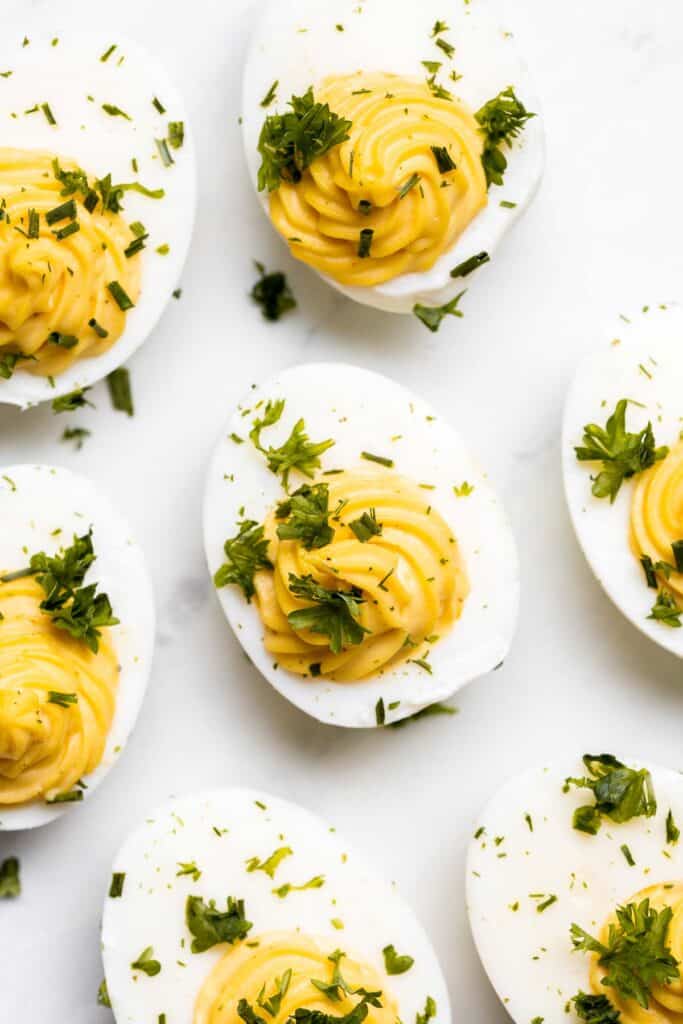 Classic deviled eggs are a simple, easy, and healthy appetizer to make when you need something quick for brunch, picnics, barbecues, potlucks, or Easter. | aheadofthyme.com
