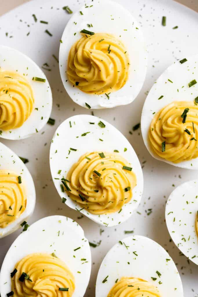 Classic deviled eggs are a simple, easy, and healthy appetizer to make when you need something quick for brunch, picnics, barbecues, potlucks, or Easter. | aheadofthyme.com