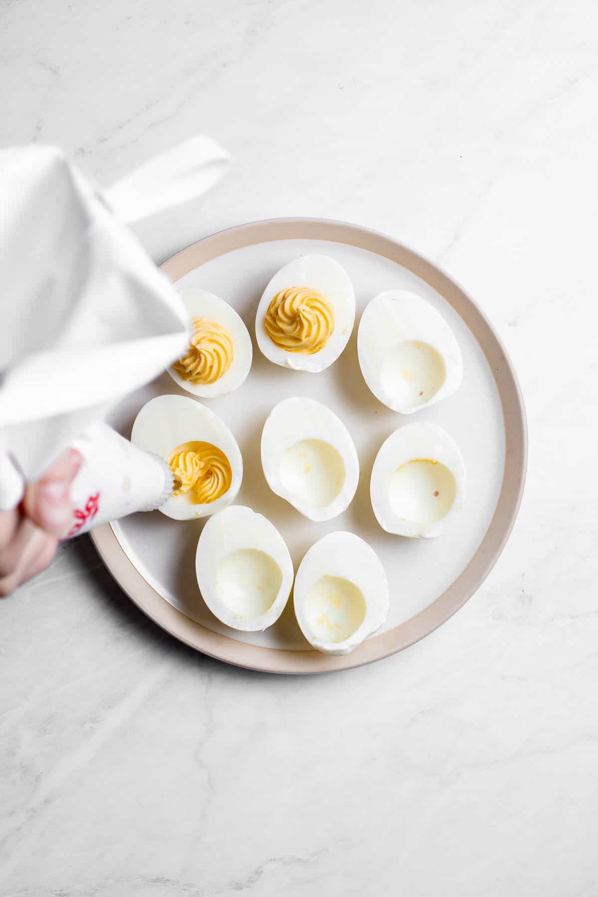 Classic deviled eggs are a simple, easy, and healthy appetizer to make when you need something quick for brunch, picnics, barbecues, potlucks, or Easter. | aheadofthyme.com