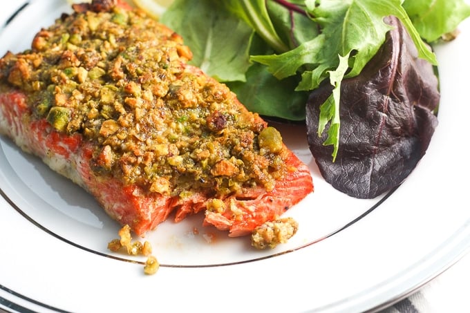 Pistachio-crusted salmon is a gourmet dinner without the gourmet skills! Prepare this with a handful of ingredients in less than 20 minutes! | aheadofthyme.com