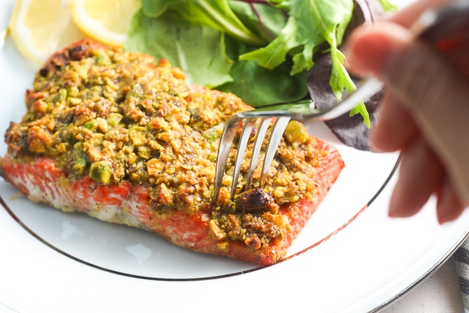 Pistachio-crusted salmon is a gourmet dinner without the gourmet skills! Prepare this with a handful of ingredients in less than 20 minutes! | aheadofthyme.com