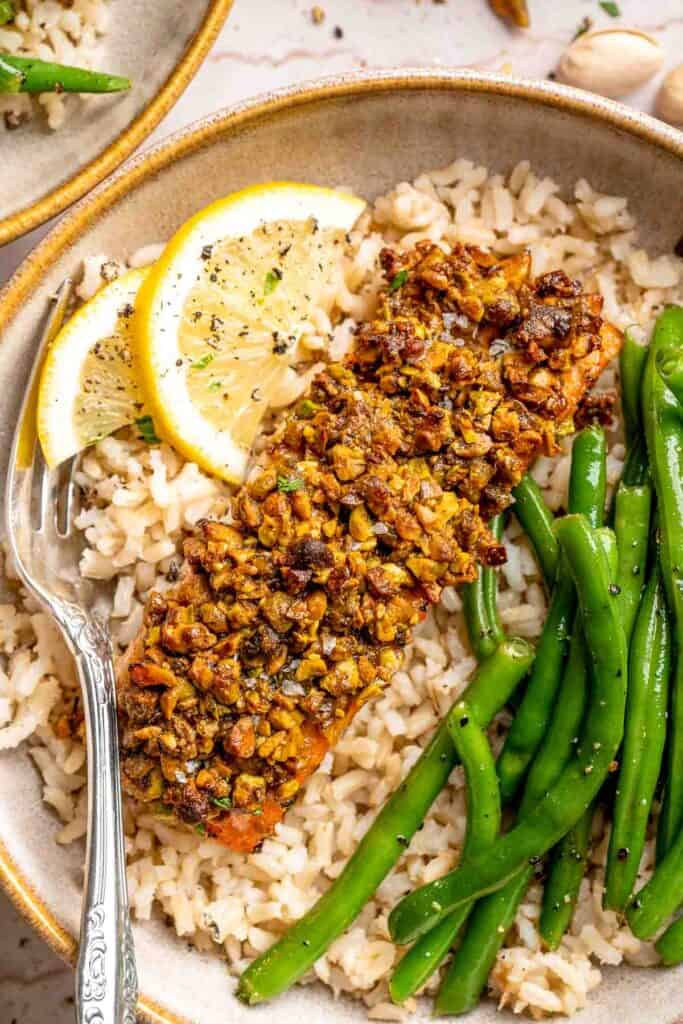 Pistachio Crusted Salmon is tender, flaky, and topped with a crunchy pistachio crust. A healthy, elegant dinner ready in 25 minutes! | aheadofthyme.com