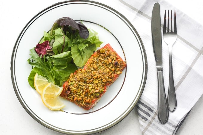 Pistachio-crusted salmon is a gourmet dinner without the gourmet skills! Prepare this with a handful of ingredients in less than 20 minutes! | aheadofthyme.com