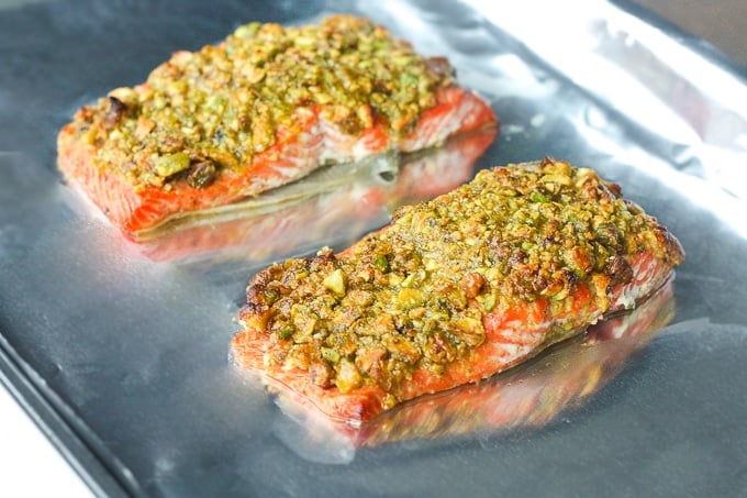 Pistachio-crusted salmon is a gourmet dinner without the gourmet skills! Prepare this with a handful of ingredients in less than 20 minutes! | aheadofthyme.com