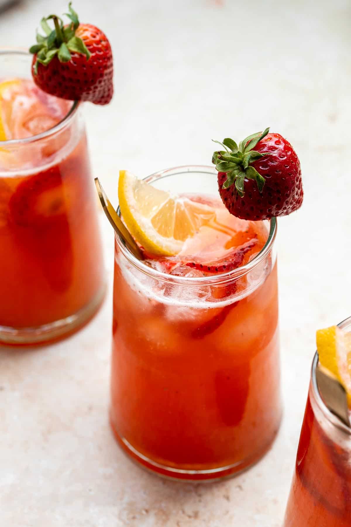 Homemade strawberry lemonade is refreshing, flavorful, and easy to make. This sparkling summer drink is loaded with fresh strawberries and lemon. | aheadofthyme.com