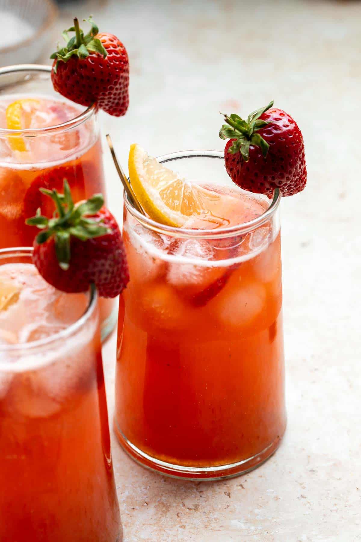 Homemade strawberry lemonade is refreshing, flavorful, and easy to make. This sparkling summer drink is loaded with fresh strawberries and lemon. | aheadofthyme.com