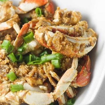 Ginger and scallion Dungeness crab is the ultimate Asian seafood experience stir-fried to perfection and coated with intense flavours. | aheadofthyme.com