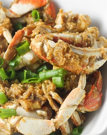 Ginger and scallion Dungeness crab is the ultimate Asian seafood experience stir-fried to perfection and coated with intense flavours. | aheadofthyme.com