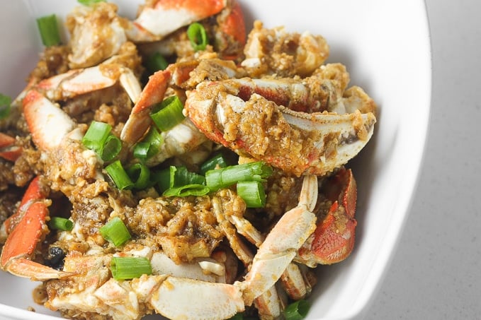 Ginger and scallion Dungeness crab is the ultimate Asian seafood experience stir-fried to perfection and coated with intense flavours. | aheadofthyme.com