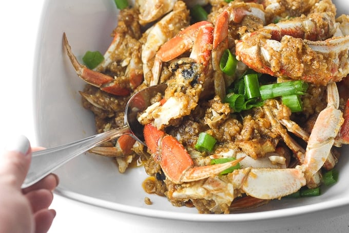 Ginger and scallion Dungeness crab is the ultimate Asian seafood experience stir-fried to perfection and coated with intense flavours. | aheadofthyme.com