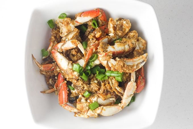 Ginger and scallion Dungeness crab is the ultimate Asian seafood experience stir-fried to perfection and coated with intense flavours. | aheadofthyme.com