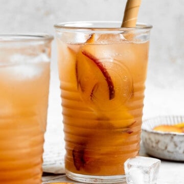 Homemade peach iced tea is healthy summer drink — refreshing, peachy, sweet, and perfect. It's loaded with real fruit and vitamins and easy to make. | aheadofthyme.com