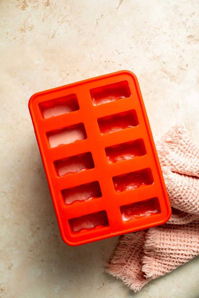 Homemade Strawberries and Cream Popsicles are healthy and easy to make using just four ingredients including fresh fruit. | aheadofthyme.com