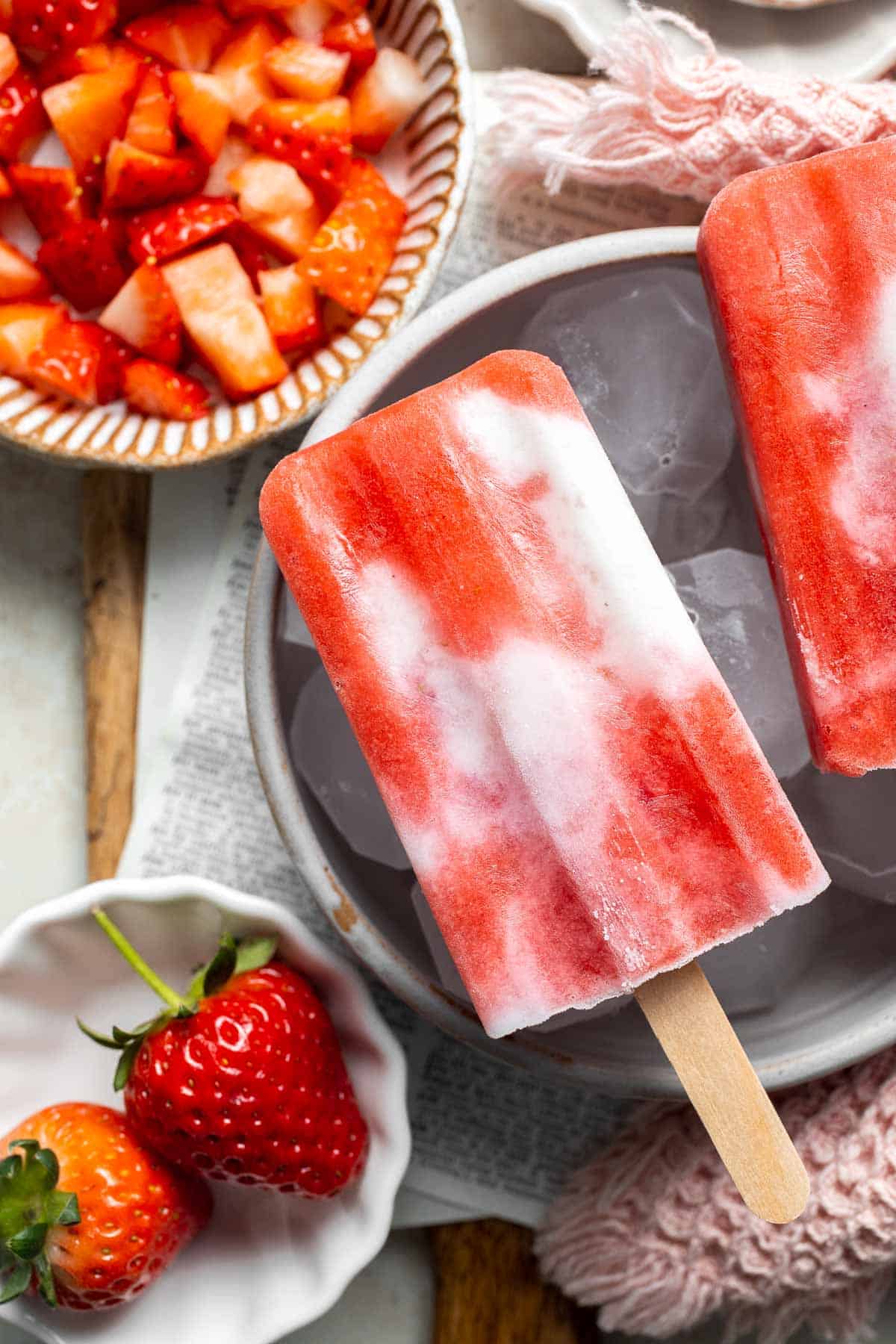 Homemade Strawberries and Cream Popsicles are healthy and easy to make using just four ingredients including fresh fruit. | aheadofthyme.com