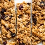 These almond cranberry chocolate chip granola bars are chewy and delicious, contain real dried fruit, and made healthier with less processed sugar. | aheadofthyme.com