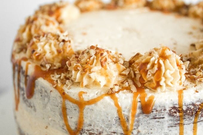 Apple cardamom cake with caramel pecan butter frosting is the perfect fall cake and is made by combining all your favourite fall flavours together. | aheadofthyme.com