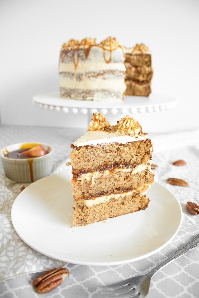 Apple cardamom cake with caramel pecan butter frosting is the perfect fall cake and is made by combining all your favourite fall flavours together. | aheadofthyme.com