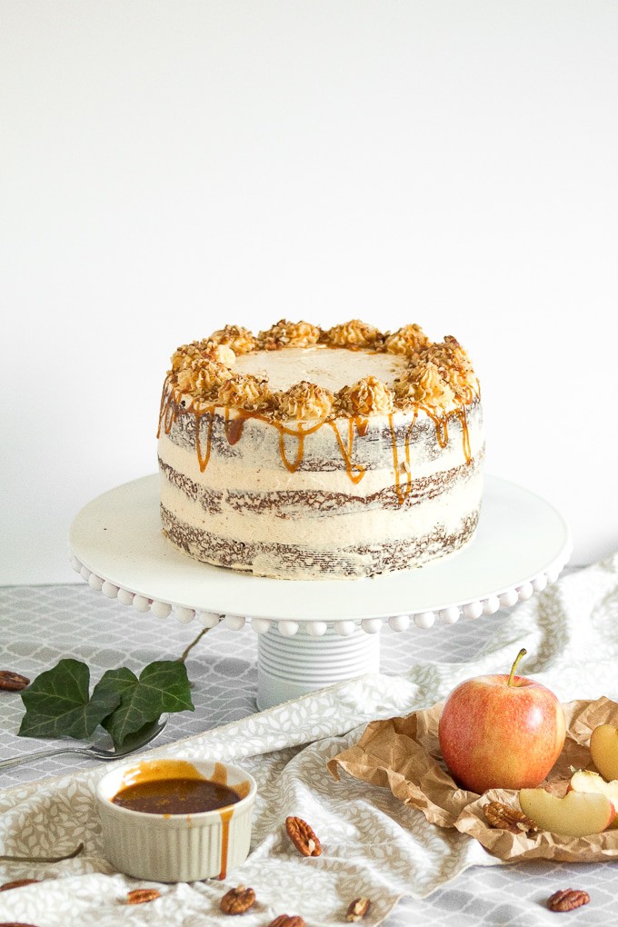 Apple cardamom cake with caramel pecan butter frosting is the perfect fall cake and is made by combining all your favourite fall flavours together. | aheadofthyme.com