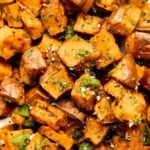 Herb Roasted Sweet Potatoes are a quick easy side dish that's healthy, delicious, and flavorful. A perfect side for your holiday table or weeknight dinner. | aheadofthyme.com