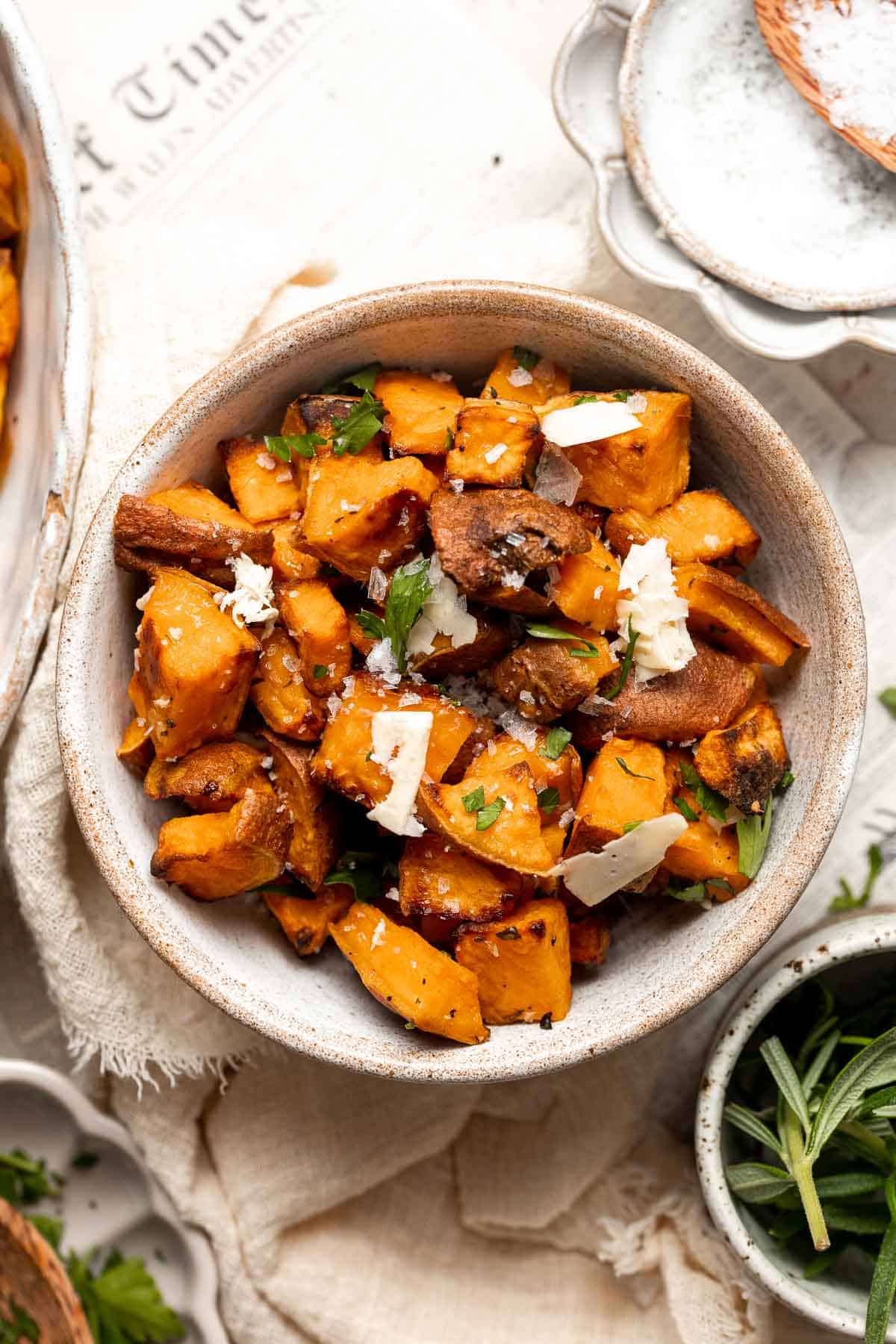 Herb Roasted Sweet Potatoes are a quick easy side dish that's healthy, delicious, and flavorful. A perfect side for your holiday table or weeknight dinner. | aheadofthyme.com