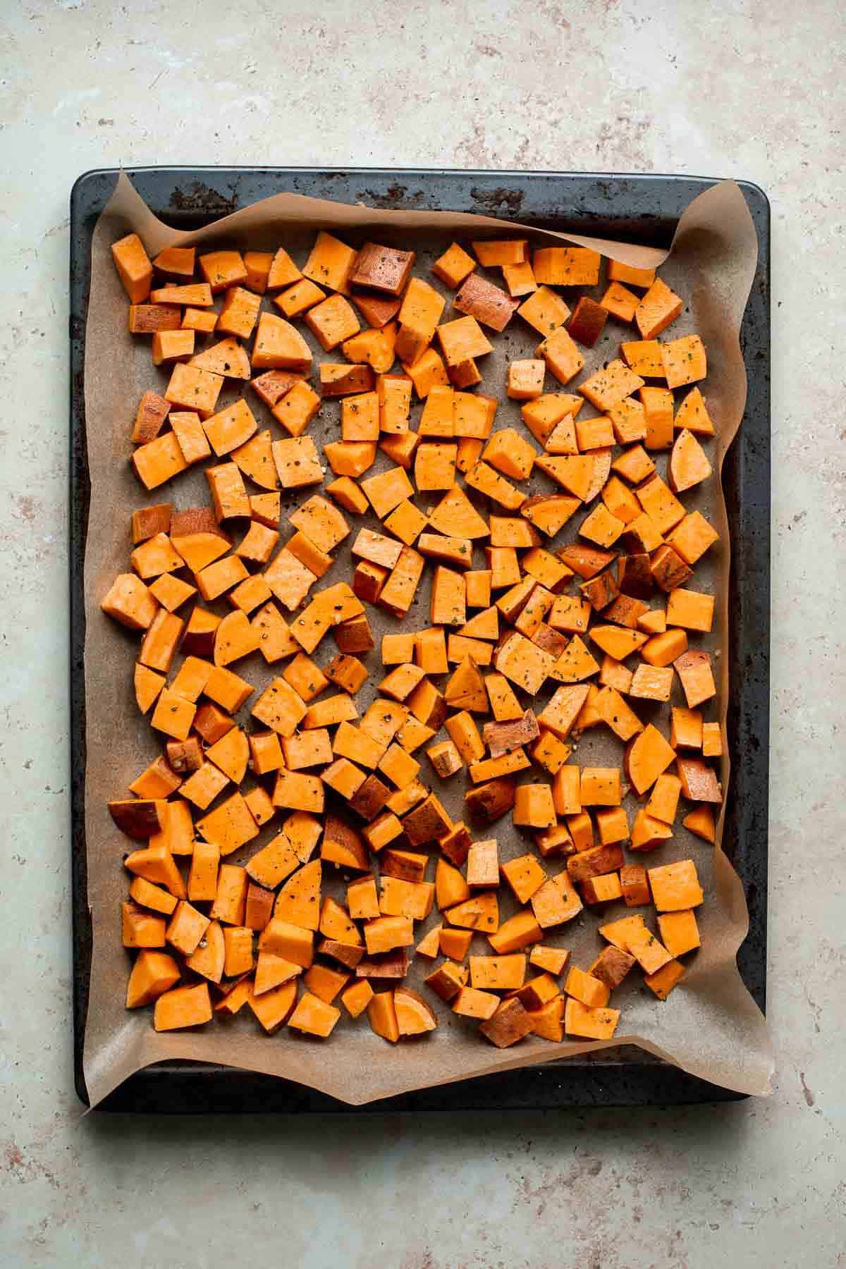 Herb Roasted Sweet Potatoes are a quick easy side dish that's healthy, delicious, and flavorful. A perfect side for your holiday table or weeknight dinner. | aheadofthyme.com