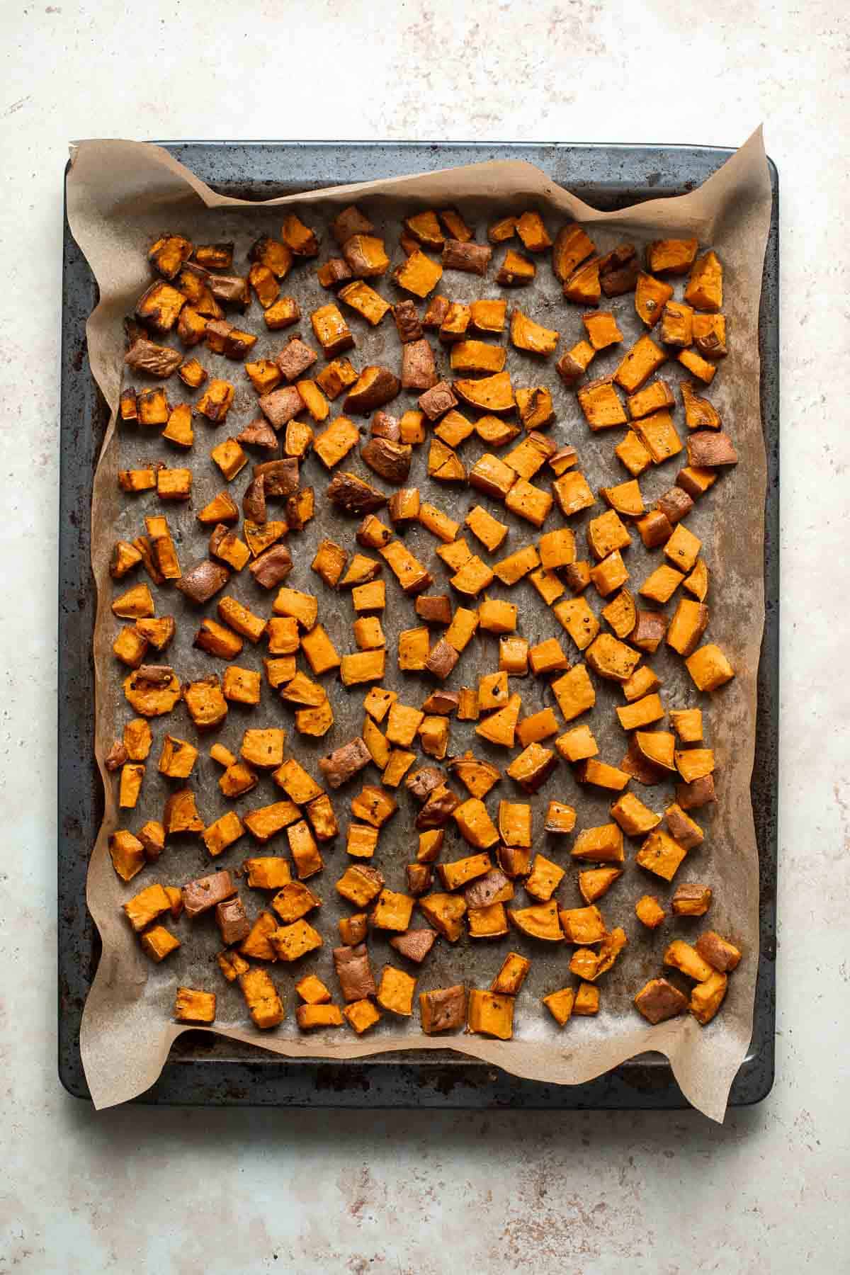 Herb Roasted Sweet Potatoes are a quick easy side dish that's healthy, delicious, and flavorful. A perfect side for your holiday table or weeknight dinner. | aheadofthyme.com