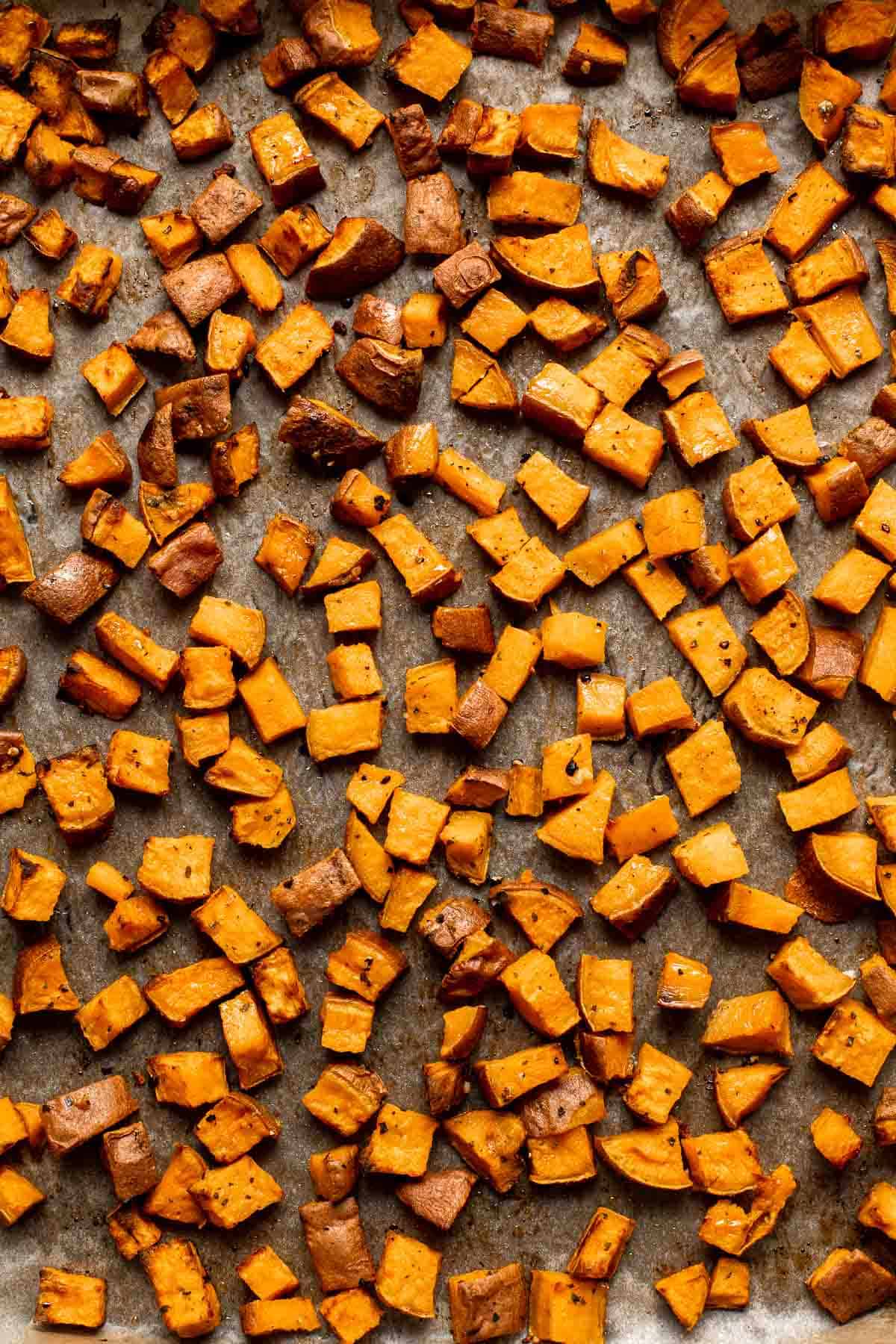 Herb Roasted Sweet Potatoes are a quick easy side dish that's healthy, delicious, and flavorful. A perfect side for your holiday table or weeknight dinner. | aheadofthyme.com