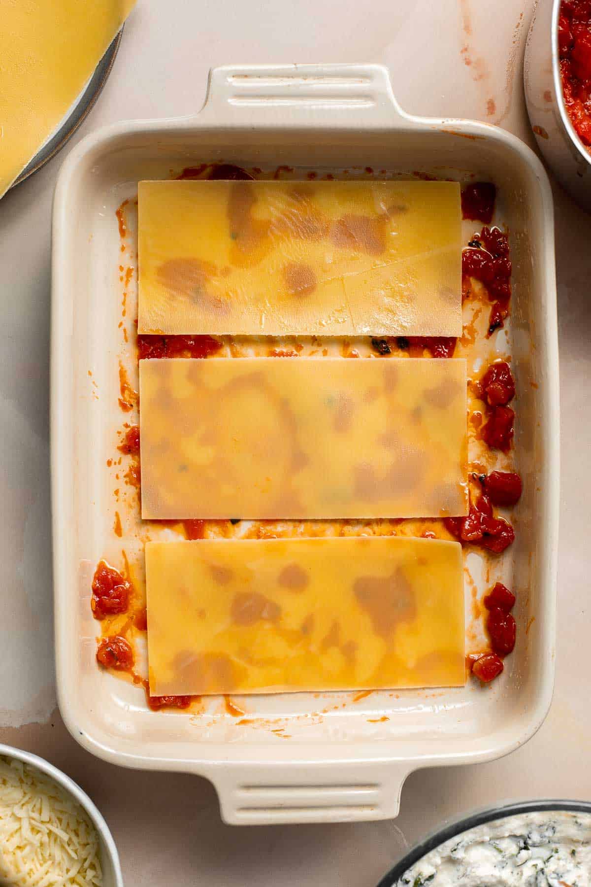 This Vegetarian Lasagna with Spinach is creamy, cheesy, and delicious. This classic Italian dish gets a meatless upgrade in this vegetarian version. | aheadofthyme.com