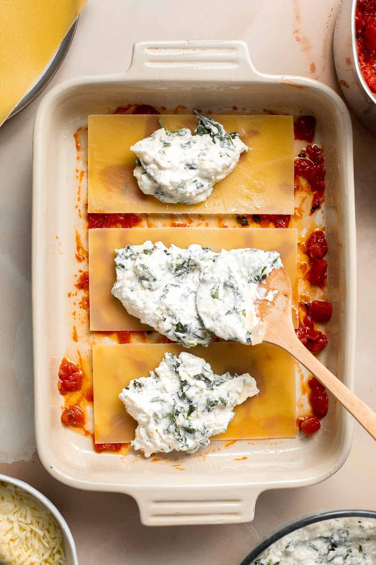 This Vegetarian Lasagna with Spinach is creamy, cheesy, and delicious. This classic Italian dish gets a meatless upgrade in this vegetarian version. | aheadofthyme.com