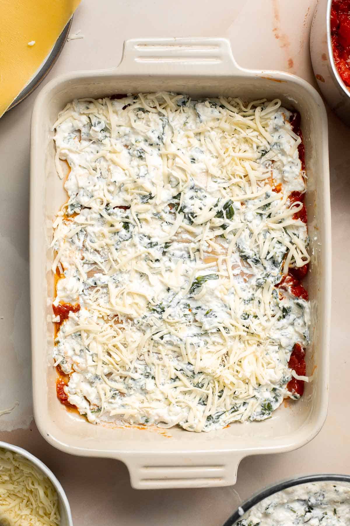 This Vegetarian Lasagna with Spinach is creamy, cheesy, and delicious. This classic Italian dish gets a meatless upgrade in this vegetarian version. | aheadofthyme.com