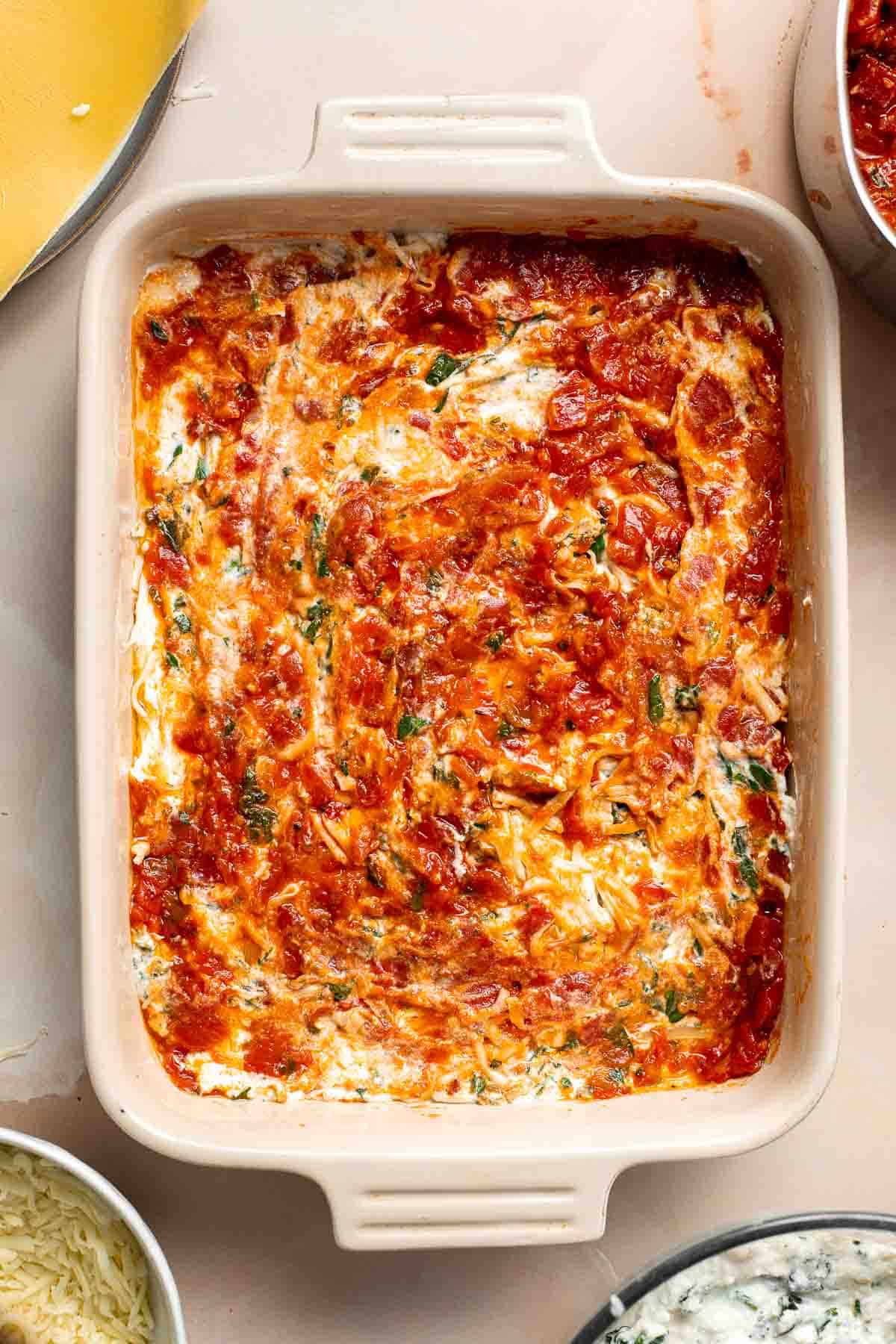 This Vegetarian Lasagna with Spinach is creamy, cheesy, and delicious. This classic Italian dish gets a meatless upgrade in this vegetarian version. | aheadofthyme.com