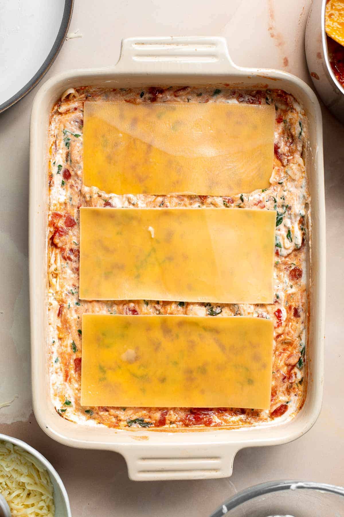 This Vegetarian Lasagna with Spinach is creamy, cheesy, and delicious. This classic Italian dish gets a meatless upgrade in this vegetarian version. | aheadofthyme.com