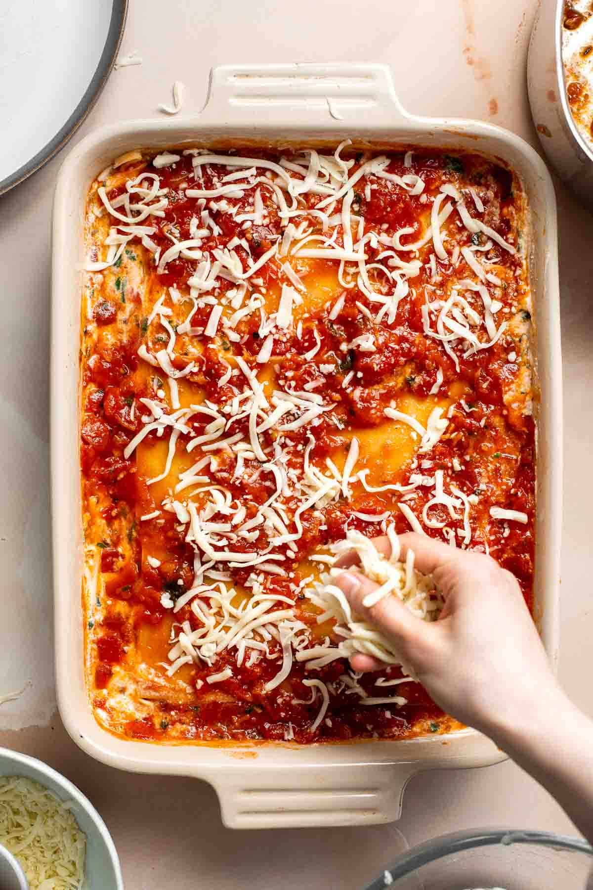 This Vegetarian Lasagna with Spinach is creamy, cheesy, and delicious. This classic Italian dish gets a meatless upgrade in this vegetarian version. | aheadofthyme.com