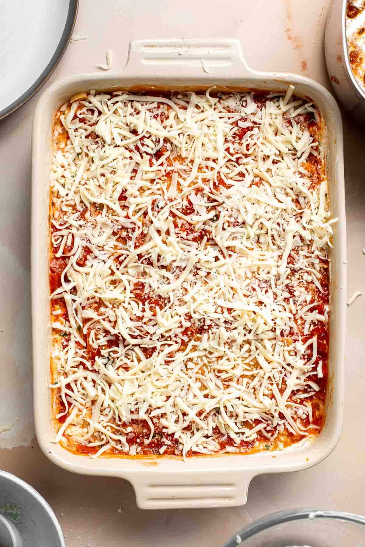 This Vegetarian Lasagna with Spinach is creamy, cheesy, and delicious. This classic Italian dish gets a meatless upgrade in this vegetarian version. | aheadofthyme.com