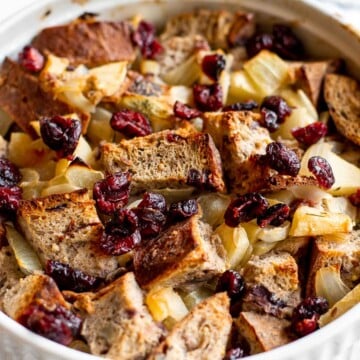 Cranberry Apple Walnut Stuffing is a cozy holiday side with apples, cranberries, herbs, and toasted bread baked until golden and delicious. | aheadofthyme.com
