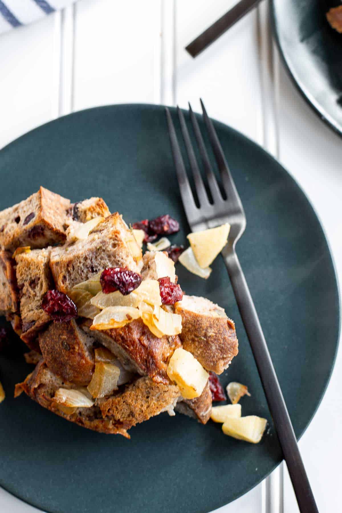 Cranberry Apple Walnut Stuffing is a cozy holiday side with apples, cranberries, herbs, and toasted bread baked until golden and delicious. | aheadofthyme.com