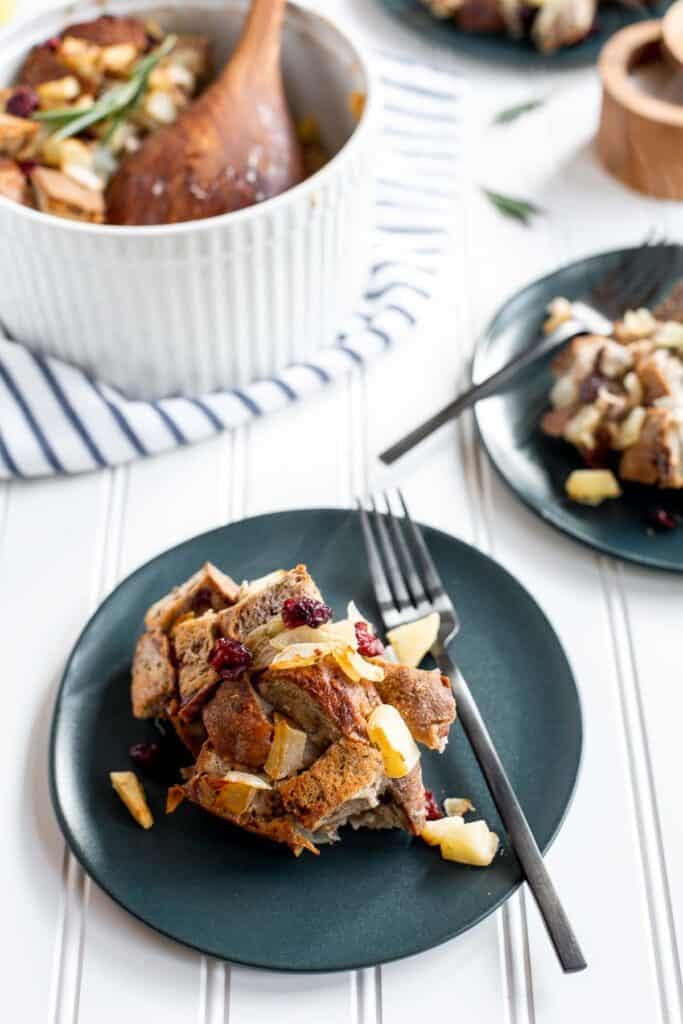 Cranberry Apple Walnut Stuffing is a cozy holiday side with apples, cranberries, herbs, and toasted bread baked until golden and delicious. | aheadofthyme.com
