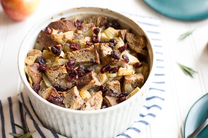 Cranberry walnut bread paired with sautéed apples, onions and rosemary is exactly what your holiday table needs! Hello cranberry walnut apple stuffing! | aheadofthyme.com