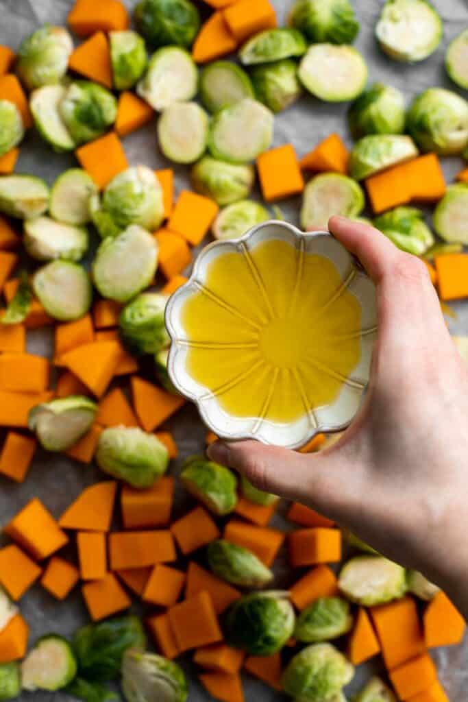 Maple Roasted Brussels Sprouts and Butternut Squash are a quick, easy, flavorful, and delicious Thanksgiving side dish that you need this holiday season. | aheadofthyme.com