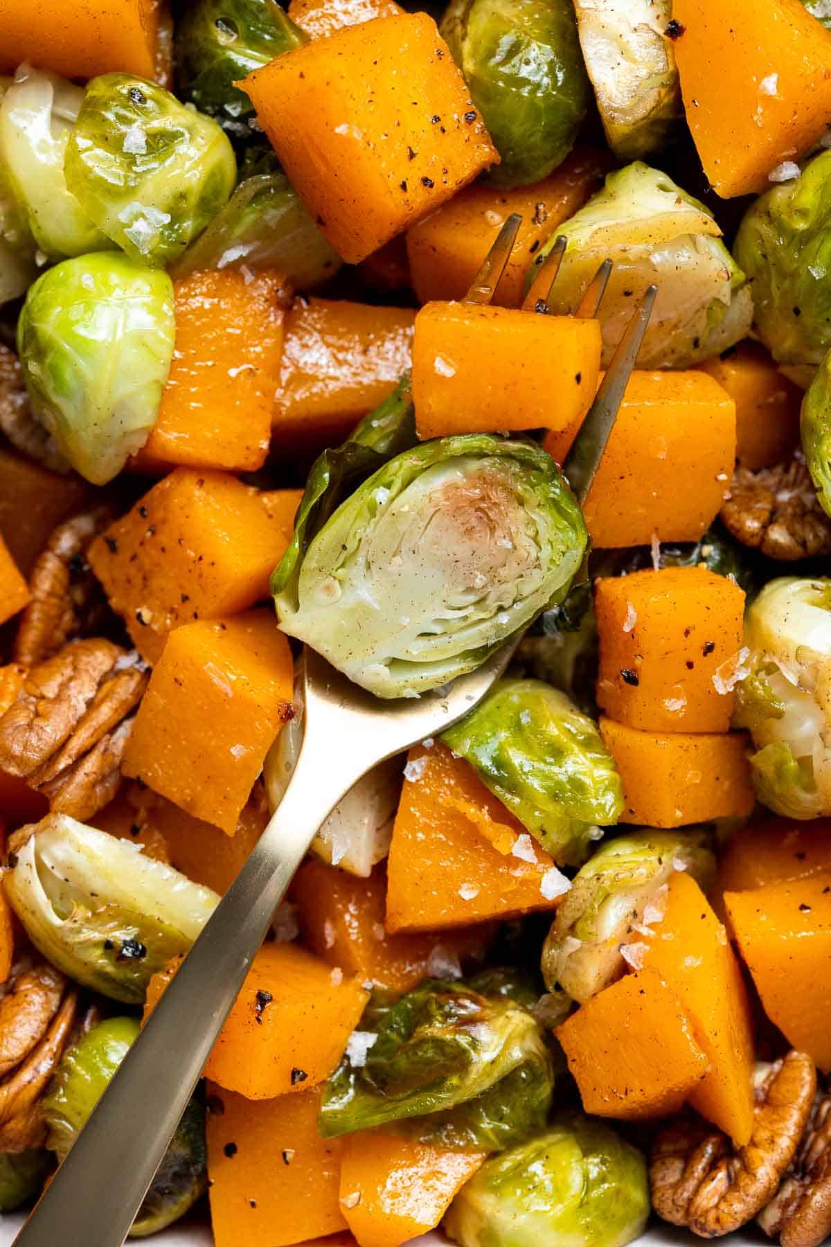 Maple Roasted Brussels Sprouts and Butternut Squash are a quick, easy, flavorful, and delicious Thanksgiving side dish that you need this holiday season. | aheadofthyme.com