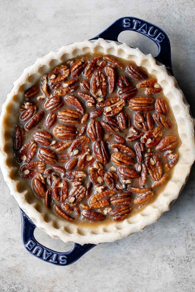 Old-fashioned pecan pie is a classic fall dessert with a homemade pie crust and sweet custard filling loaded with crunchy pecans — perfect for Thanksgiving. | aheadofthyme.com