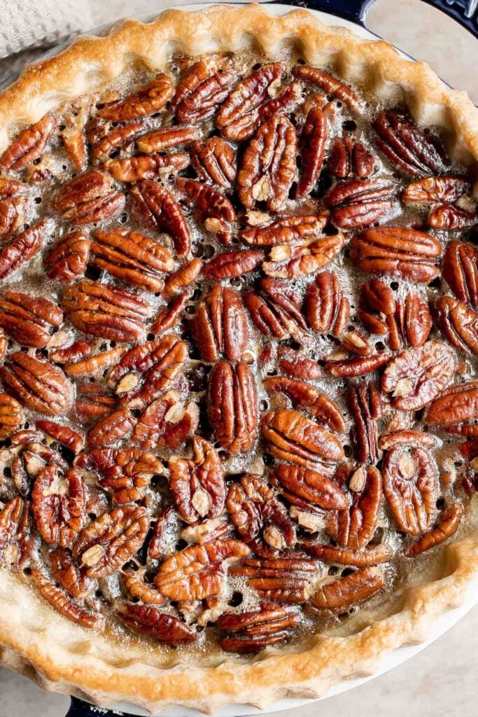 Old-fashioned pecan pie is a classic fall dessert with a homemade pie crust and sweet custard filling loaded with crunchy pecans — perfect for Thanksgiving. | aheadofthyme.com