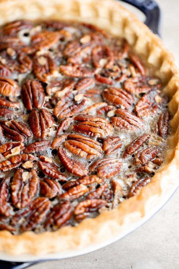 Old-fashioned pecan pie is a classic fall dessert with a homemade pie crust and sweet custard filling loaded with crunchy pecans — perfect for Thanksgiving. | aheadofthyme.com