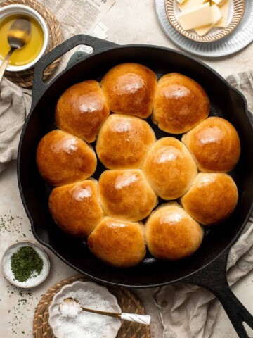Quick and Easy Skillet Dinner Rolls are soft, fluffy, and served warm right out of the oven making them the only bread recipe you’ll need with dinner. | aheadofthyme.com