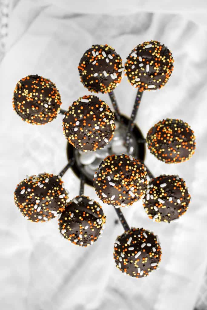 Trick or Treat! Easy to make and decorate, bite-sized spooky chocolate cake pops packed with chocolate and sprinkles are the perfect Halloween treat. | aheadofthyme.com