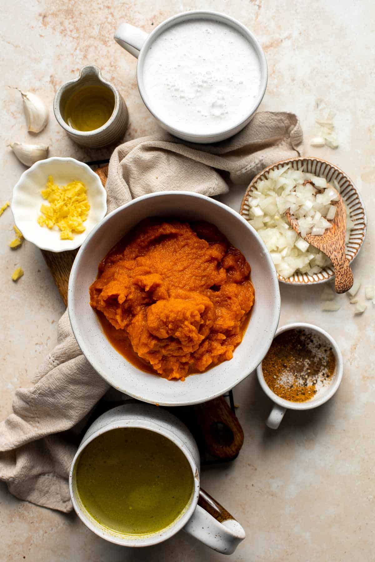 Coconut Curry Pumpkin Soup is rich, creamy, flavorful, and delicious. This vegan soup is ready just over 35 minutes with minimal prep and in one pot. | aheadofthyme.com