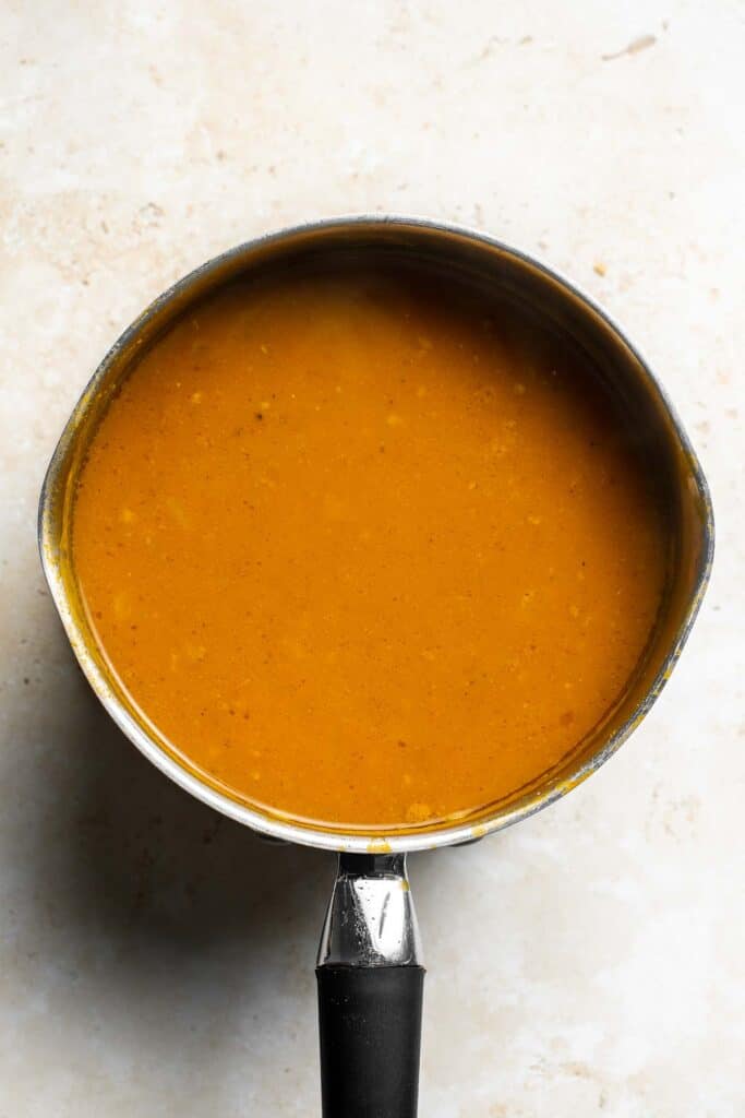 Coconut Curry Pumpkin Soup is rich, creamy, flavorful, and delicious. This vegan soup is ready just over 35 minutes with minimal prep and in one pot. | aheadofthyme.com