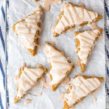 Quick and easy Starbucks inspired mini glazed pumpkin scones are the perfect little fall treat packed with pumpkin flavour and topped with two sweet glazes. | aheadofthyme.com